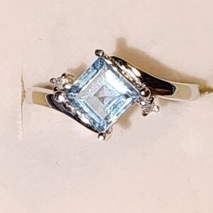 Swiss blue topaz 1 carat gem radiant-cut, 925 silver ring, diamond accents sz: 7